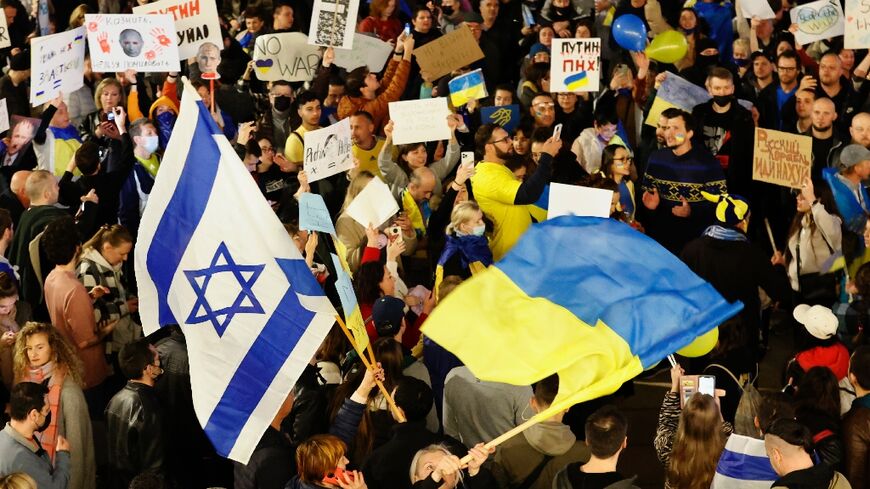People protest against Russia's invasion of Ukraine, in front of the Russian embassy in the Israeli coastal city of Tel Aviv