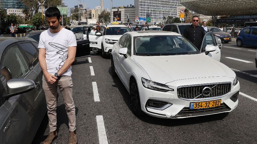 Israeli drivers, including these in Tel Aviv, stopped and stood in silence beside their vehicles to remember victims of the Holocaust