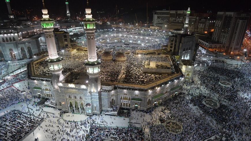 Pilgrims gather at the Grand Mosque in Saudi Arabia's holy city of Mecca on August 7, 2019: Saudi said it will dramatically increase numbers for the hajj in 2022