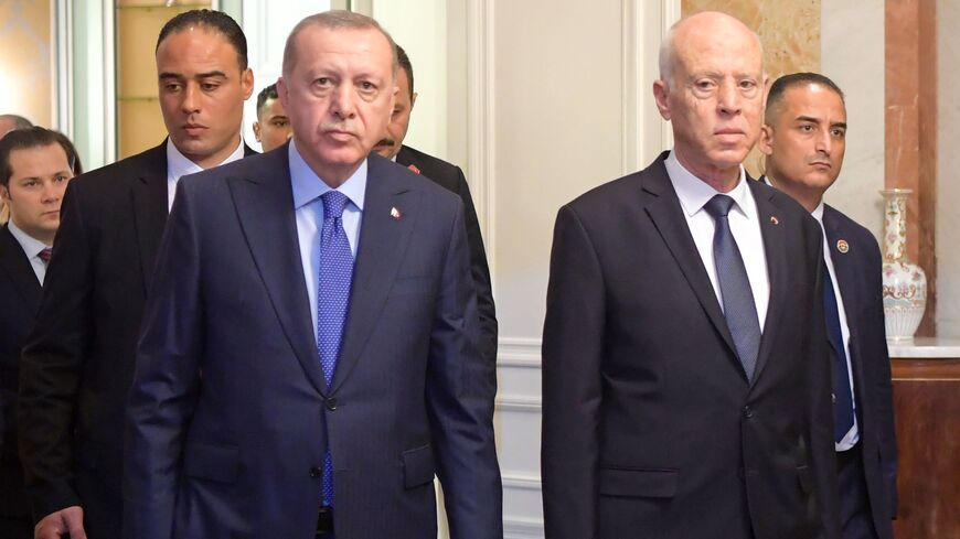 Tunisian President Kais Saied (R) arrives with Turkish President Recep Tayyip Erdogan.