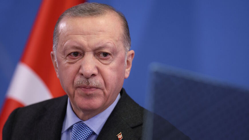 Turkey's President Recep Tayyip Erdogan addresses media representatives during a press conference at an European Union (EU) summit at EU Headquarters in Brussels on March 24, 2022. 