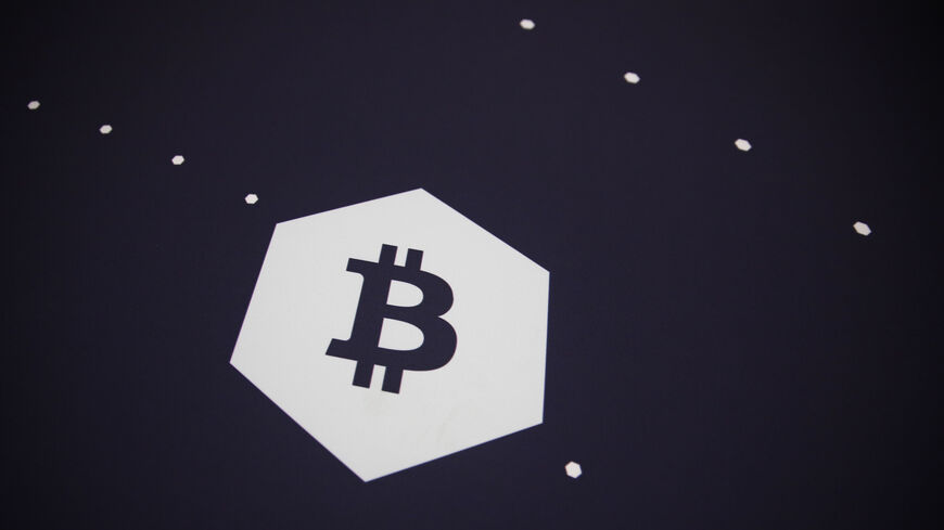 A bitcoin logo is seen.
