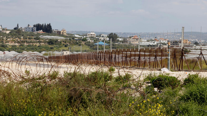 This photo shows the security fence near Ibthan (in the Zemer local council) in central Israel separating it from the West Bank, April 13, 2022.