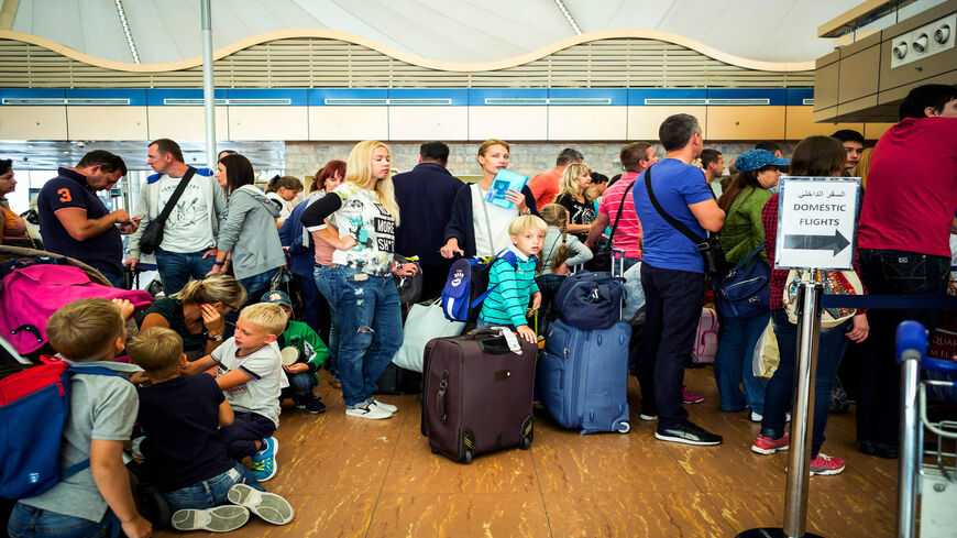 Ukrainian tourists wait to check in for their flight at Sharm el-Sheikh airport, Egypt, Nov. 5, 2015.