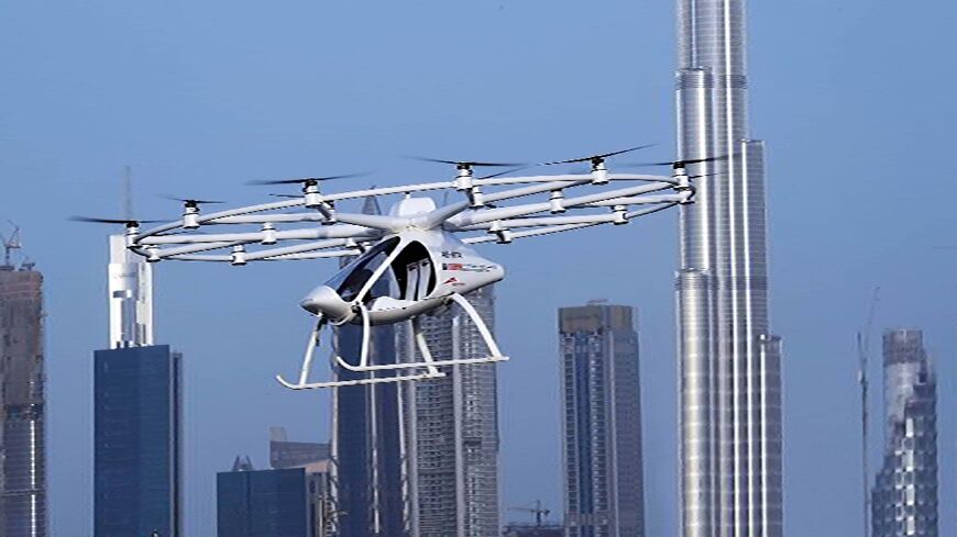 A two-seater  a prototype driverless "hover taxi" flying in a "concept" flight in Dubai in 2017, seen this photograph provided by United Arab Emirates News Agency