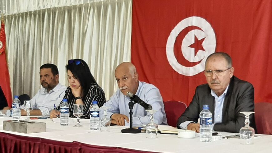 Noureddine Taboubi, on the right, the secretary-general of the Tunisian General Labour Union, chairs a meeting on May 23, 2022