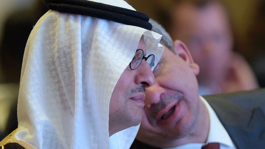 Saudi Energy Minister Abdulaziz bin Salman (L) and Iraqi Oil Minister Ihsan Abdul-Jabbar Ismail at  a Middle East energy conference in the Bahraini capital Manama
