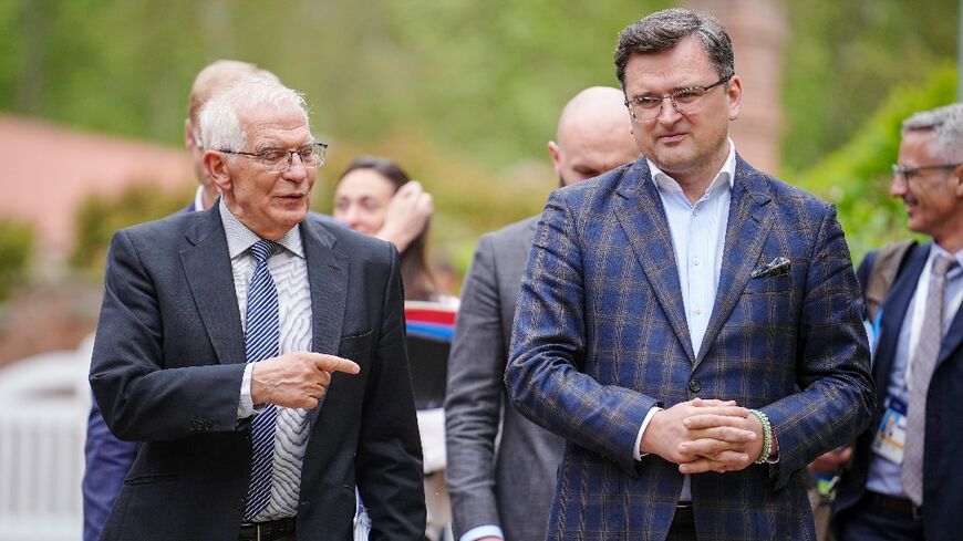 EU foreign policy chief Josep Borrell (left) meets Ukraine's Foreign Minister Dmytro Kuleba at a Group of Seven foreign ministers meeting in Wangels, Germany 
