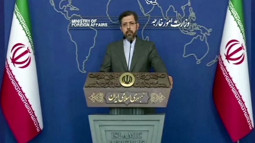 An image grab from a video released by state-run Iran Press news agency on May 31, 2022 shows Iran's Foreign Ministry spokesman Saeed Khatibzadeh briefing reporters in Tehran -- he said the IAEA report was not "fair and balanced"