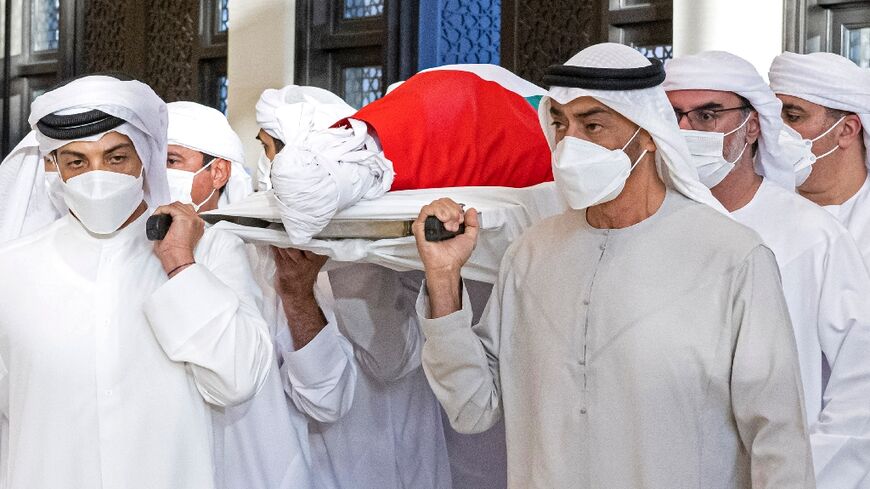 Abu Dhabi Crown Prince Mohamed bin Zayed leads the pallbearers at the funeral of his half-brother UAE President Sheikh Khalifa bin Zayed Al-Nahyan