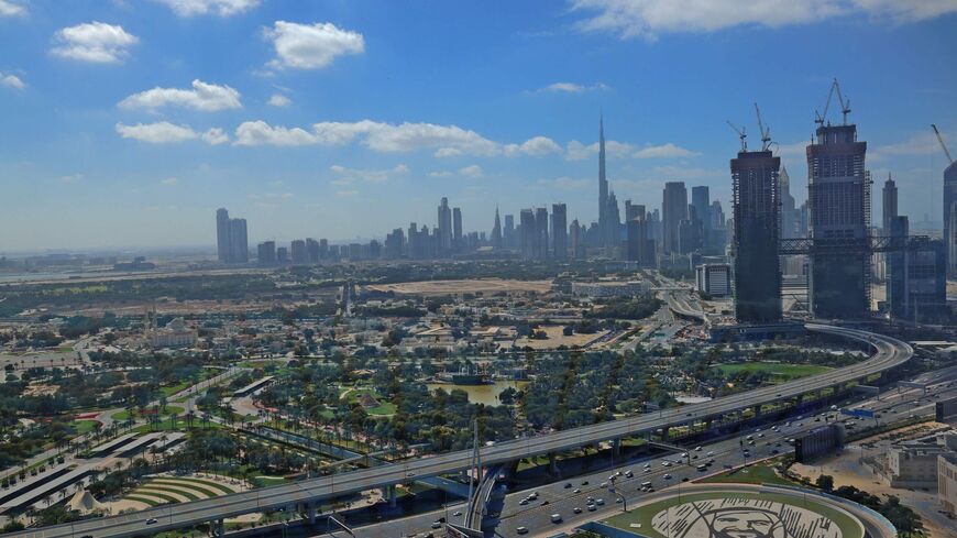 This picture taken on on Feb. 1, 2021 shows a view of the downtown Dubai skyline, with Burj Khalifa, as seen from the Dubai Frame vantage point. 