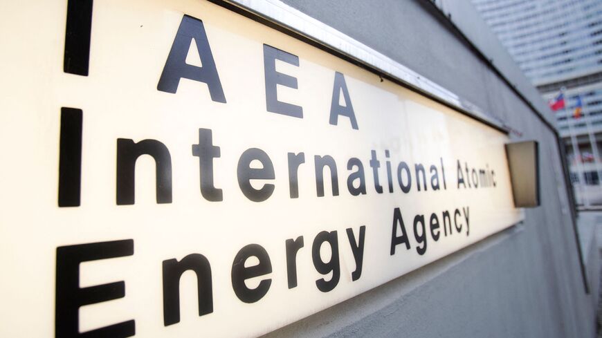 The sign of the International Atomic Energy Agency (IAEA) is pictured in front of the headquarters, photographed in Vienna on Dec. 17, 2021. 