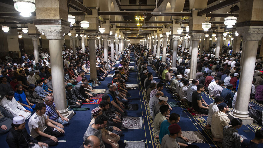 Muslim worshippers pray on Laylat al-Qadr during the holy month of Ramadan at Al-Azhar Mosque, Cairo, Egypt, April 27, 2022.