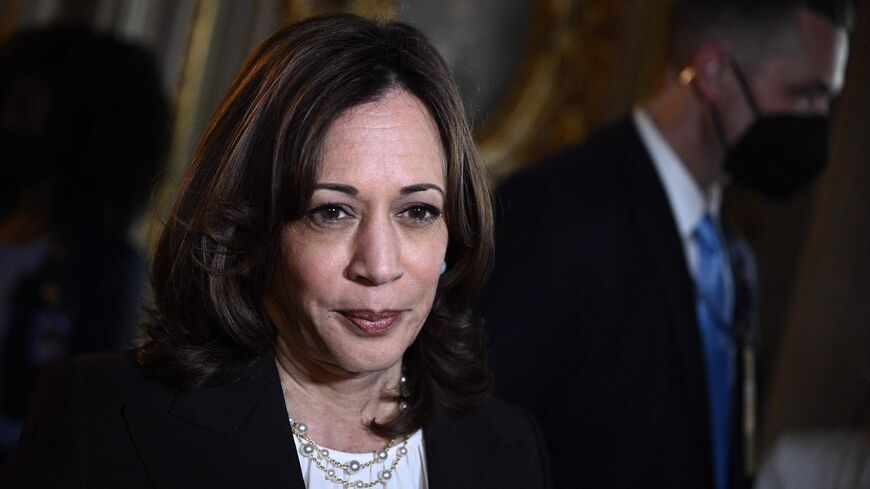US Vice President Kamala Harris speaks to reporters while departing the Senate Chamber at the US Capitol in Washington, DC, on May 11, 2022. 