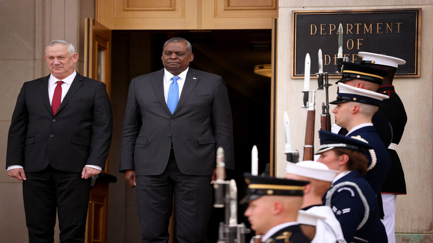 US Secretary of Defense Lloyd Austin (R) and Israeli Minister of Defense Benny Gantz (L) stand at attention during the playing of the Israeli national anthem at an arrival ceremony at the Pentagon, Arlington, Virginia, June 3, 2021.