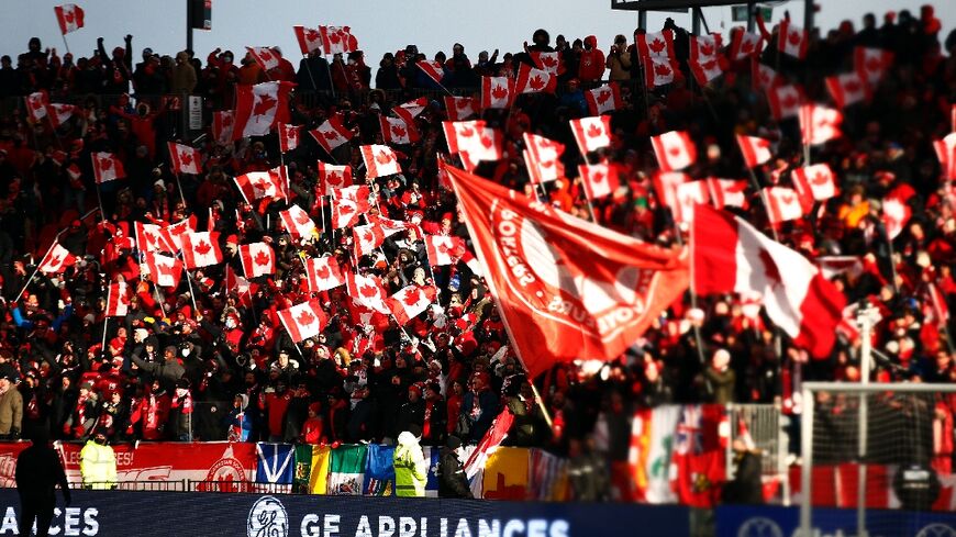Canadian fans celebrate after the team's qualification for the World Cup in March 2022