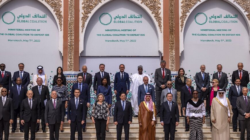 Delegates of the the ministerial meeting of the coalition against the Islamic State (IS) group pose for a photo ahead of their meeting in Marrakesh