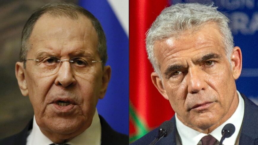 Israeli Foreign Minister Yair Lapid (R) on May 2, 2022 slammed his Russian counterpart Sergei Lavrov (L) for alleging Adolf Hitler may have "had Jewish blood" and summoned Moscow's ambassador for "clarifications"