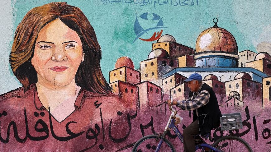 A mural pays tribute to slain Al Jazeera journalist Shireen Abu Akleh in Gaza City
