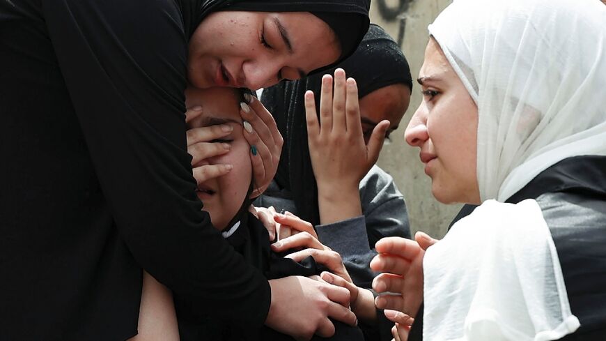 The sisters of 17-year-old Palestinian Amjad al-Fayed killed in clashes during an Israeli army raid in Jenin on the occupied West Bank mourn his death