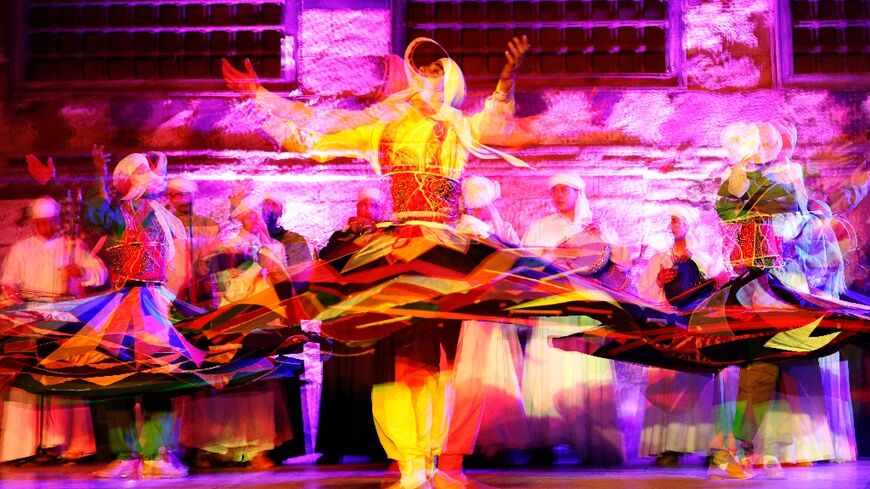Egypt's kaleidoscopic whirling dervish performance, known as 'tanoura', is a world away from those of Turkey, who trace their origins to the teachings of Sufi poet and mystic Jalal al-Din Rumi
