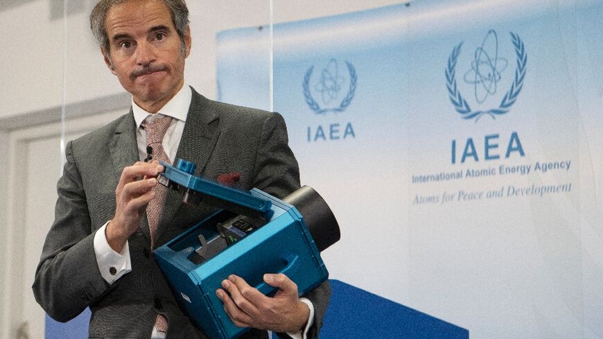 IAEA Director-General Rafael Grossi in December 2021 showed one of the surveillance cameras placed in Iran's nuclear facilities; the removal of 27 cameras by Iran in June 2022 was a 'serious move,' he said 