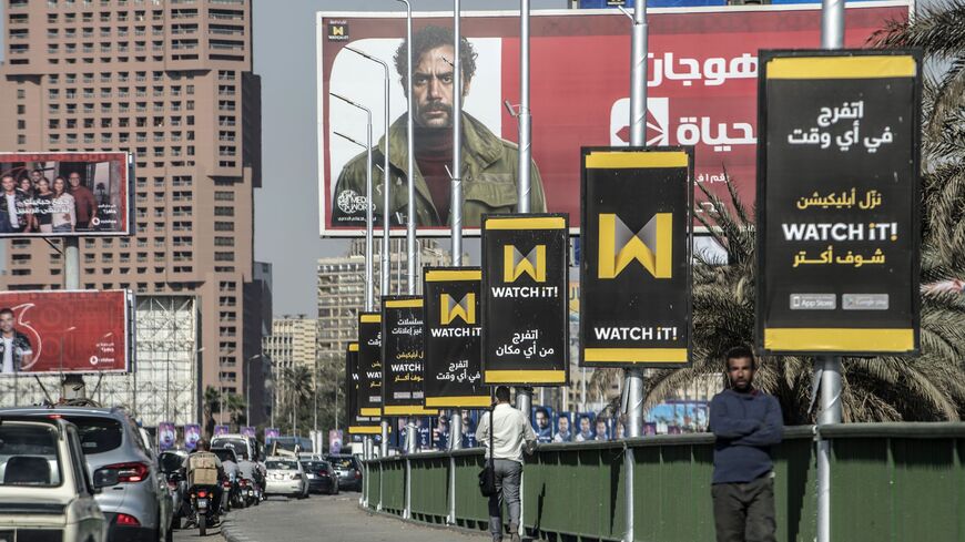 A picture taken on May 7, 2019, shows billboards advertising "Watch iT," Egypt's first video-streaming app, in Cairo. 