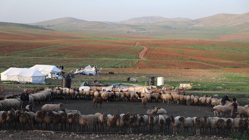 Bedouins' sheep and structures are pictured in the village of Humsah al-Baqia in the Israeli occupied West Bank.