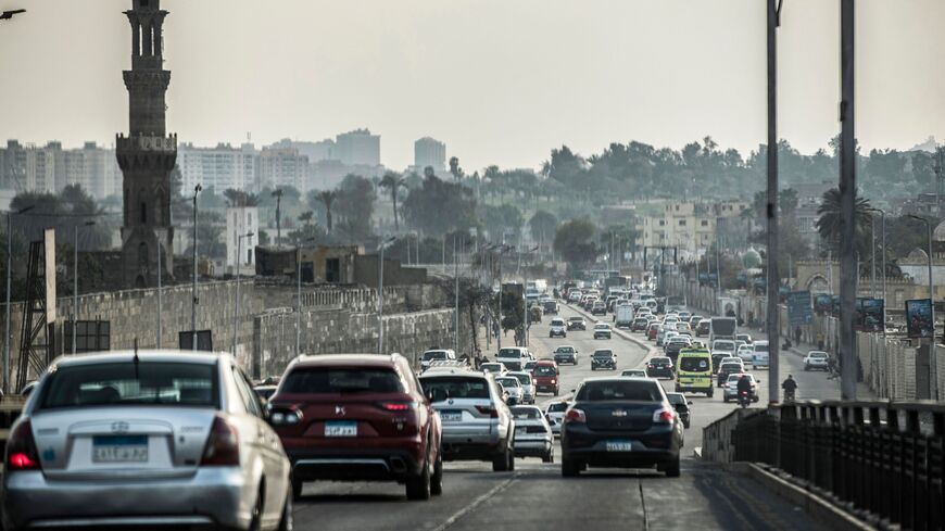 This picture taken on Feb. 22, 2021, shows a view of vehicles in the Sayeda Aisha district of Egypt's capital, Cairo.