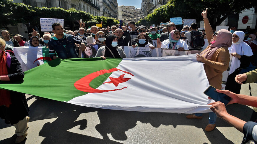 Algerian anti-government protesters take to the streets of Algiers as the Hirak pro-democracy movement keeps up its weekly demonstrations despite a ban on gatherings due to the coronavirus pandemic, Algeria, March 26, 2021.