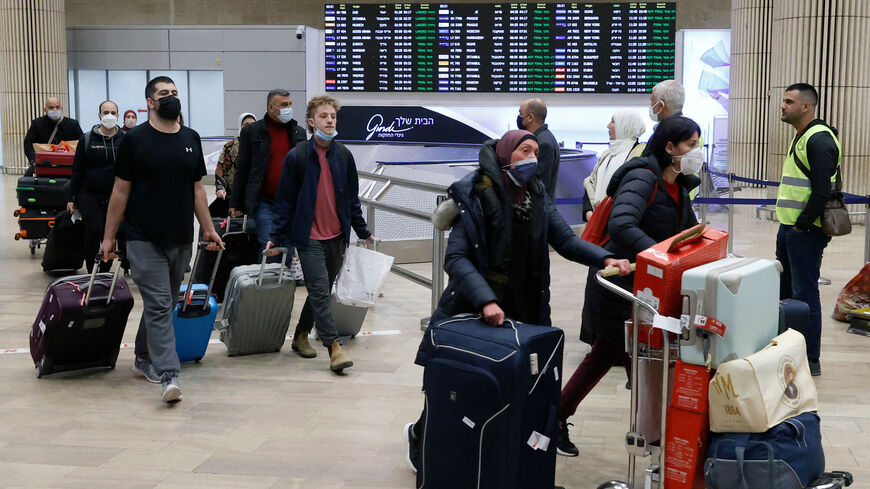 Israeli passengers arrive from Ukraine via the border with Romania on an Israeli Israir flight at Ben Gurion Airport in Lod, near Tel Aviv, Israel, March 1, 2022.