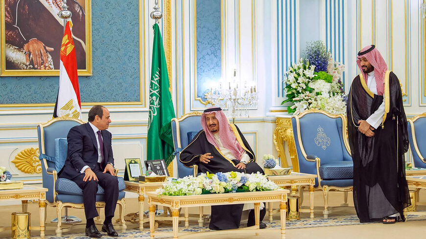 Saudi King Salman bin Abdul-Aziz Al Saud (C) and Crown Prince Mohammed bin Salman (R) are seen receiving Egyptian President Abdel Fattah al-Sisi, Riyadh, Saudi Arabia, March 8, 2022.
