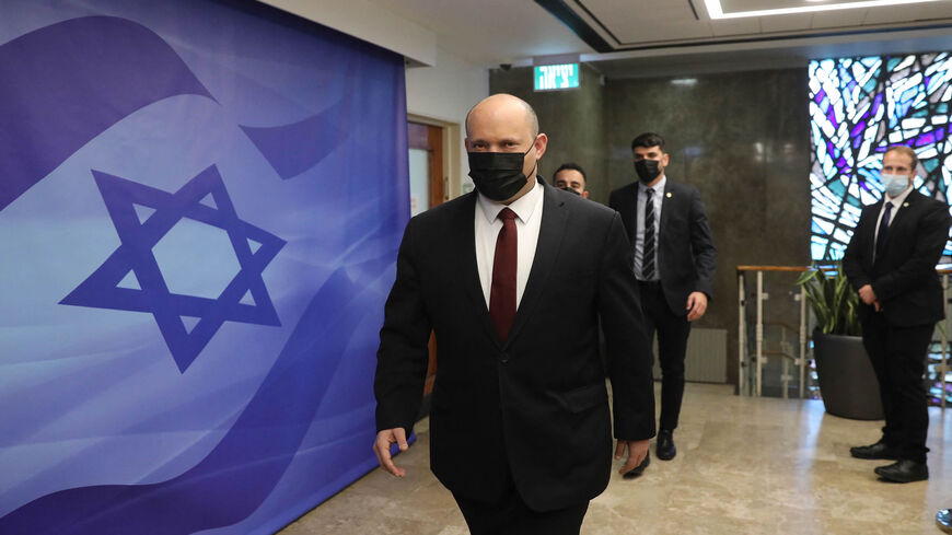 Israeli Prime Minister Naftali Bennett arrives for a Cabinet meeting at the prime minister's office, Jerusalem, March 27, 2022.