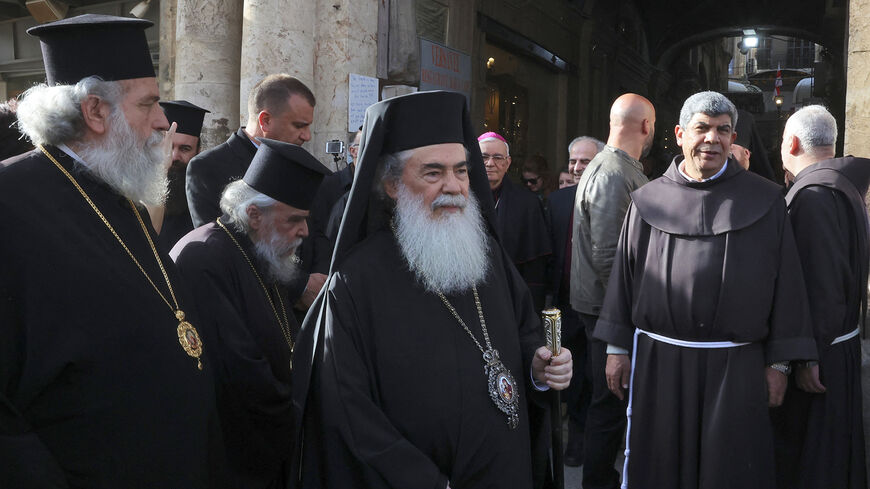 Greek Orthodox Patriarch of Jerusalem Theophilos III (C) arrives for a meeting with other religious leaders at the Petra Hotel at the Jaffa Gate area, Old City of Jerusalem, March 29, 2022.
