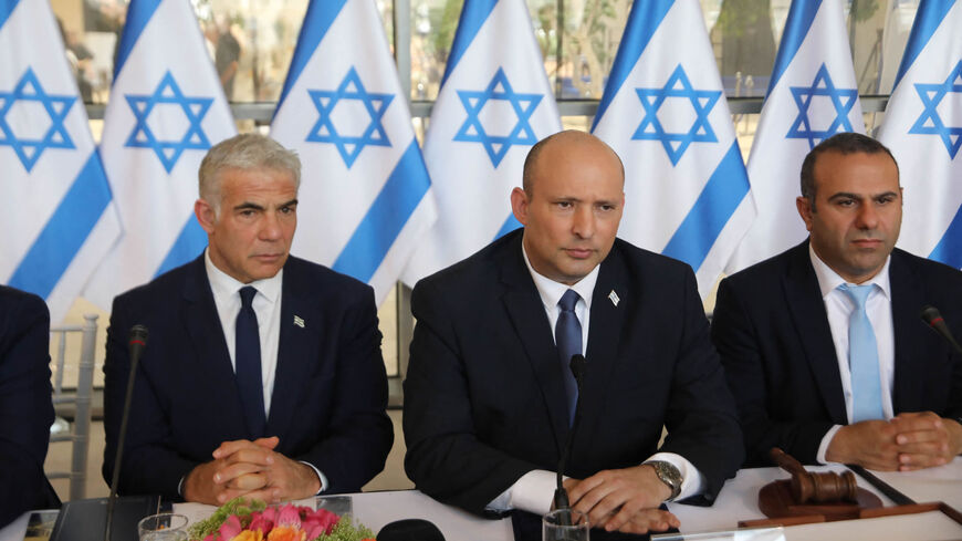 Israeli Foreign Minister Yair Lapid, Prime Minister Nafrali Bennet and Knesset member Abir Kara attend a weekly Cabinet meeting, Jerusalem, May 29, 2022.