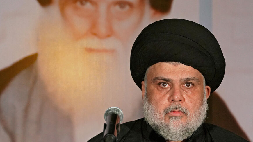 Iraqi Shiite cleric Muqtada al-Sadr delivers a speech in the central Iraqi city of Najaf on June 3, 2022.