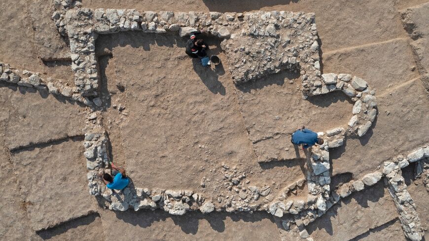 An aerial view shows Palestinian workers of Israel's Antiquities Authority at the recently discovered ancient mosque