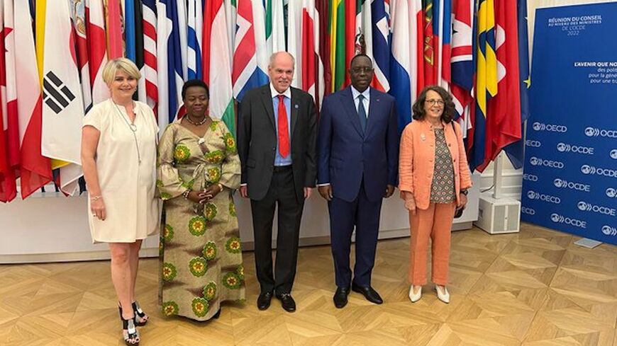African Union Chief and President of Senegal Macky Sall (2-R) participates at the OECD Africa Forum in France, on June 10, 2022.