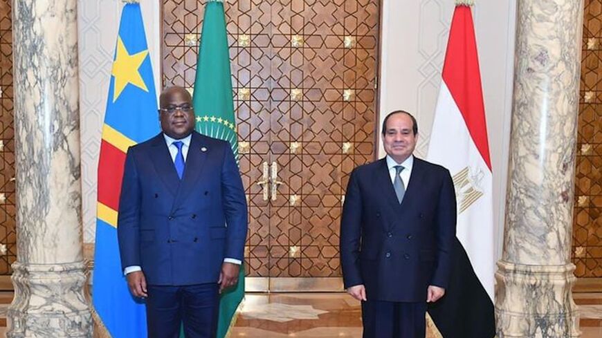 Egypt's President Abdel Fattah al-Sisi (R) stands with Congolese President Felix Tshisekedi (L).