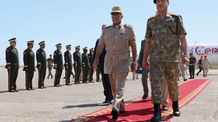 General Abdel Razaq al-Nadhouri (C), second in command of the forces of eastern-based strongman Khalifa Haftar, made an unprecedented visit to Tripoli on Monday and Tuesday to meet with his counterpart in the west, General Mohammad al-Haddad