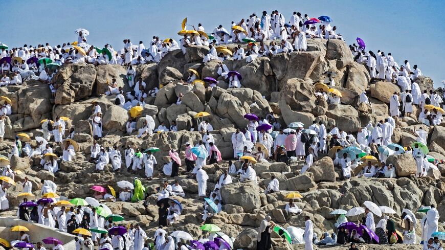 Muslim pilgrims gather atop Mount Arafat, southeast of the holy city of Mecca