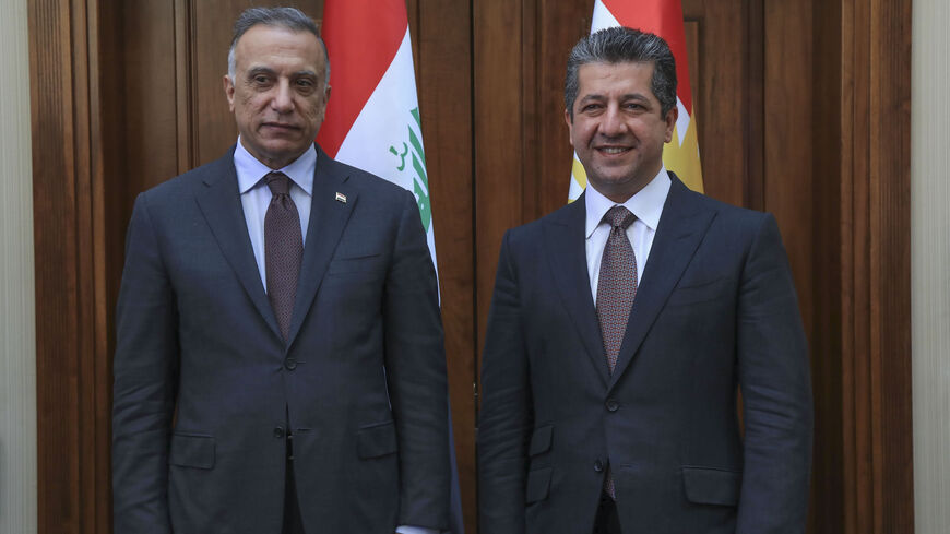 Prime Minister of the Kurdistan Regional Government Masrour Barzani (R) welcomes Iraqi Prime Minister Mustafa al-Kadhimi, Erbil, Iraqi Kurdistan, Sept. 10, 2020.