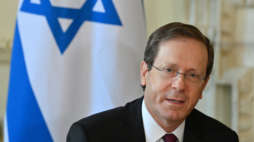 Israeli President Isaac Herzog meets with Britain's Prime Minister Boris Johnson (not pictured) inside Number 10 Downing Street, London, England, Nov. 23, 2021.