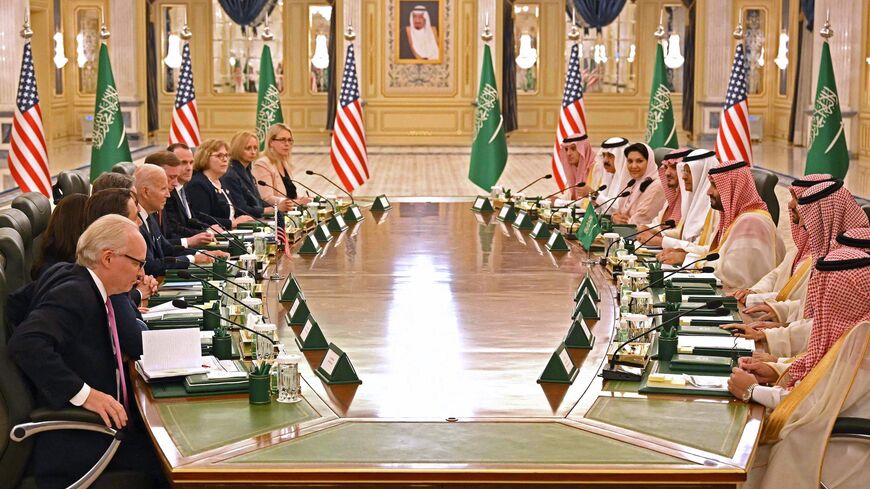 US President Joe Biden (C-L) takes part in a working session with Saudi Arabias Crown Prince Mohammed bin Salman (C-R) at the Al Salam Royal Palace in the Saudi coastal city of Jeddah, on July 15, 2022. 