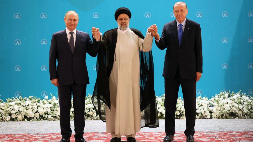 (L-R) Russian President Vladimir Putin, Iranian President Ebrahim Raisi and Turkish President Recep Tayyip Erdogan.