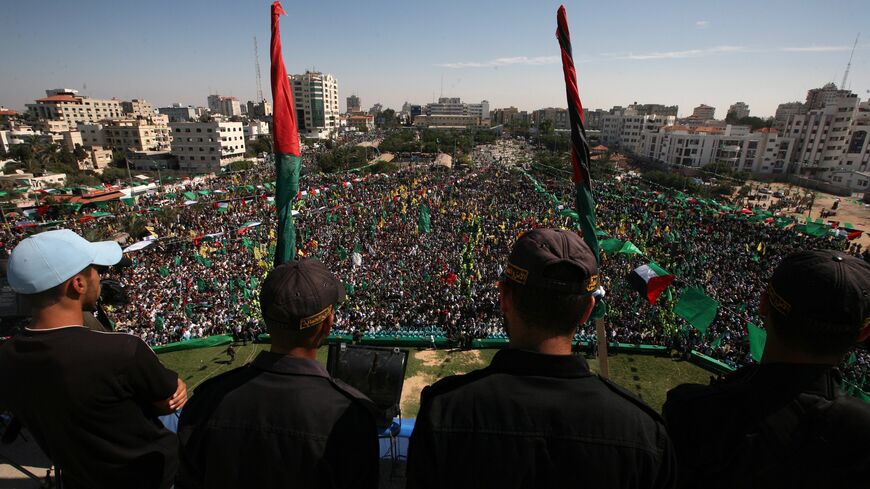 Palestinians celebrate the release of hundreds of prisoners following a swap with captured Israeli soldier Gilad Shalit on October 18, 2011, in Gaza City. 