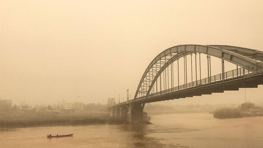 A picture taken on February 18, 2017, shows a general view of a bridge in the Iranian city of Ahvaz during a sandstorm. 