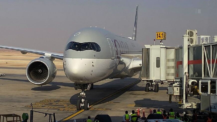 A Qatar Airways passenger jet is seen at Riyadh's Hamad International Airport in this file picture taken on January 11, 2021