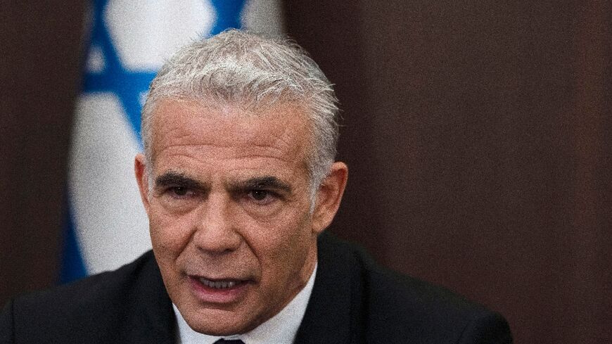 Israeli Prime Minister Yair Lapid makes a statement at the start of the weekly cabinet meeting in Jerusalem on July 10