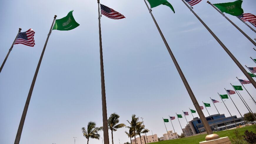 Saudi and US flags line the King Abdulaziz Road in the Saudi Red Sea port city of Jeddah ahead of a visit by US President Joe Biden